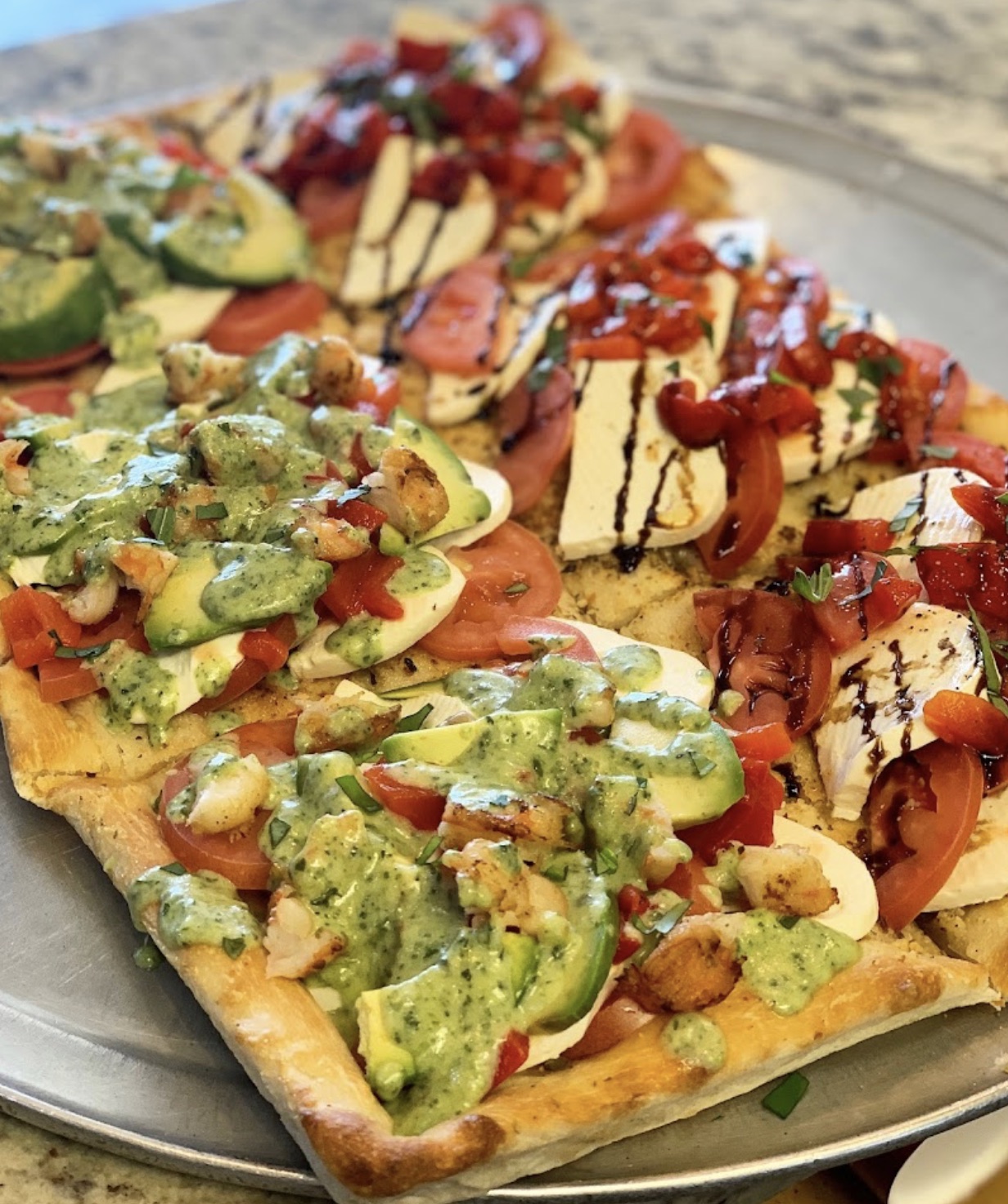 Specialty square pizzas from Mozzarella's Pizza